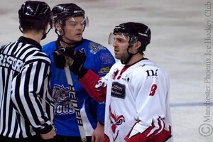 Greg Wood talks it out with the linesman