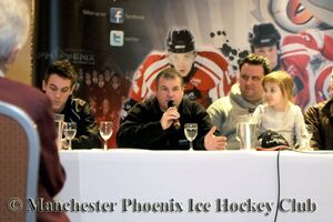 Neil Morris talking at the top table at the fan meeting on 2nd Feb 2011