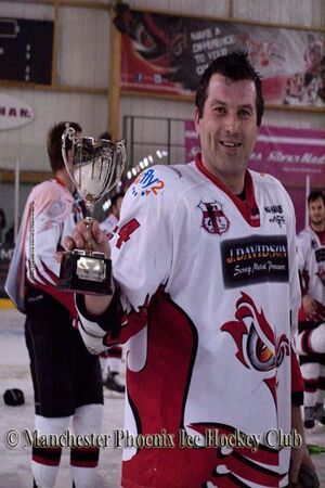 Ladislav shows off the trophy