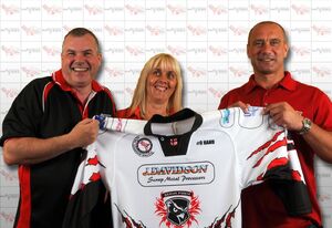 Neil Morris and Tony Hand presenting Caron Davidson with a shirt