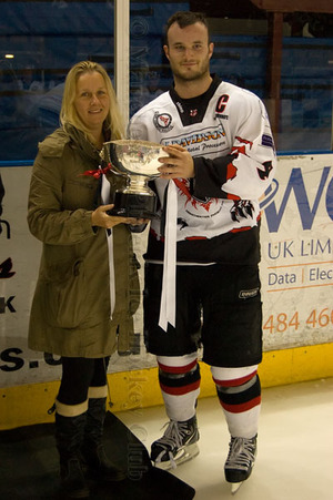 Luke Boothroyd receives the trophy