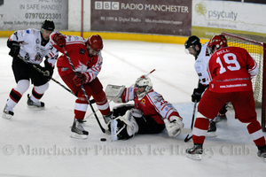 Skinns and the Swindon defence work hard to deny Phoenix in the first period
