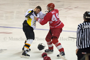 James Archer takes on Nicky Watt early in the game