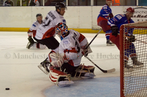 Steve Fone deflects away the puck in the third period