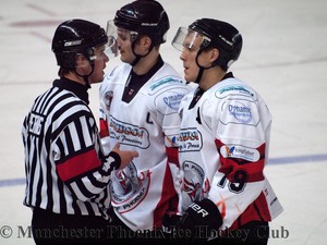 Tom Duggan talks it out with the referee