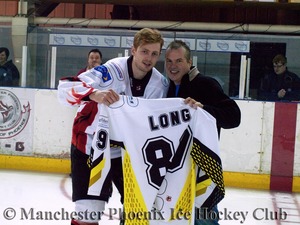 Ciaran Long receives a jersey from team owner, Neil Morris