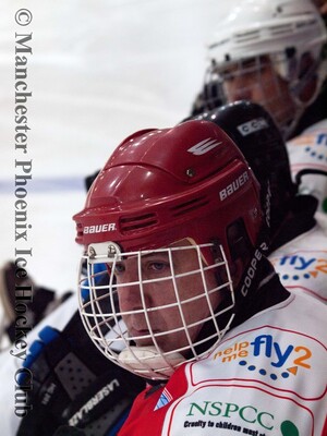 Patrick Bailey of the Phoenix sledge team watches the play