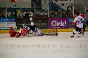 Michal Psurny scores whilst being brought down