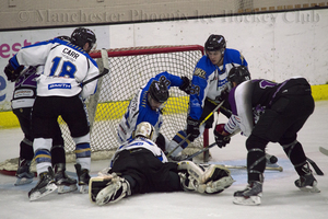 A goalmouth scramble in the Lightning crease