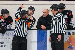 Tony Hand debates the finer points of the rule book with the officials
