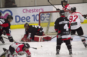 Steve Fone covers the puck