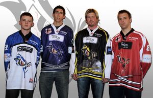 Some of the players model the 2009-2010 shirts