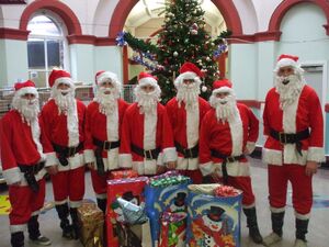 Phoenix players dressed as Santa at Booth Hall Hospital