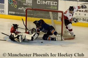 The Phantoms bundle the puck into the net