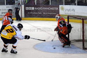 James Archer blasts his shot into the Telford net