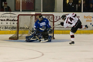 Stephen Wallace scores his penalty shot