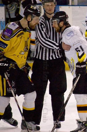 Scott Spearing and Ondrej Pozivil get in each other's faces