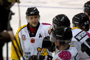 James Archer takes fist bumps at the bench after the first goal