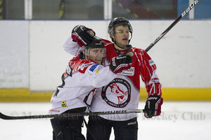James Archer celebrates the first goal with Michal Psurny