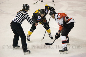 Robin Kovar goes in for a face off