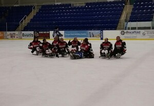 The Phoenix Sledge Team on the ice