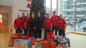 The Phoenix Players at the hospital with the presents