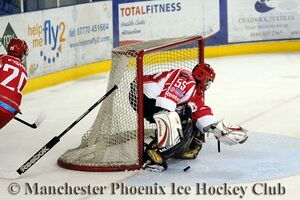 Swindon's Douglas loses his stick and the puck during a shocking first period